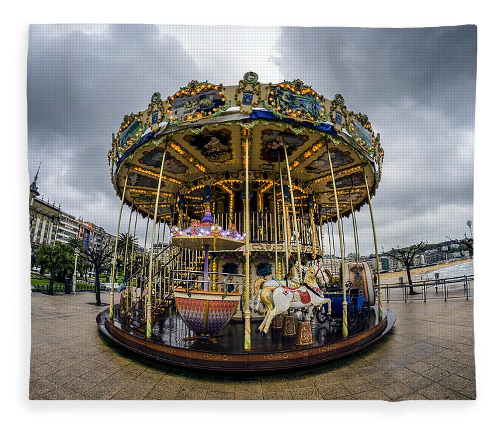 Merry Fleece Blanket featuring the photograph Merry-go-Round by Pablo Lopez