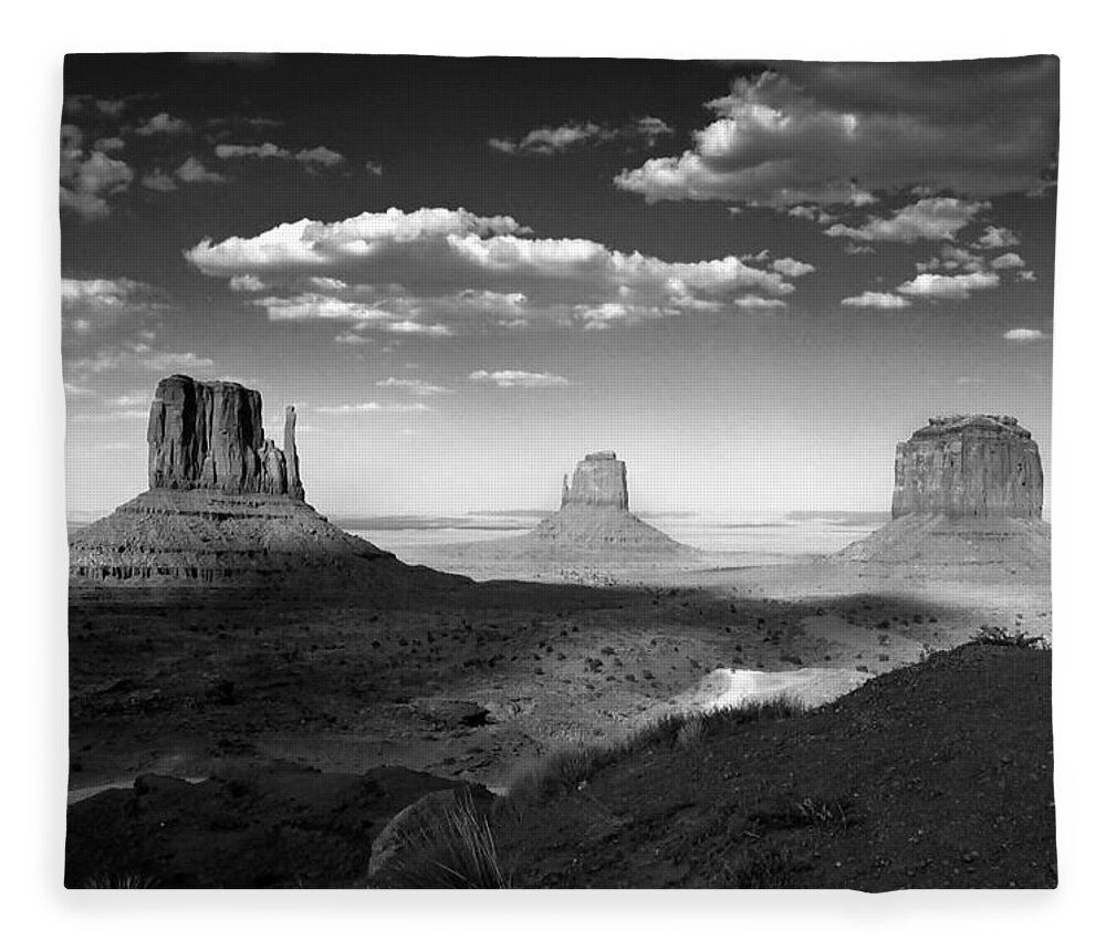 Travel Fleece Blanket featuring the photograph Monument Valley in Black and White by Lucinda Walter