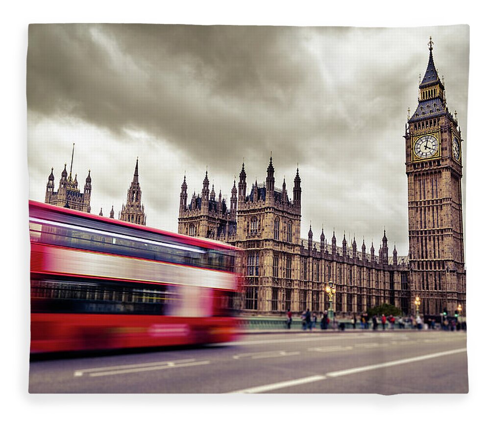 Clock Tower Fleece Blanket featuring the photograph Motion Blurred Image Of Double Decker by Filippobacci