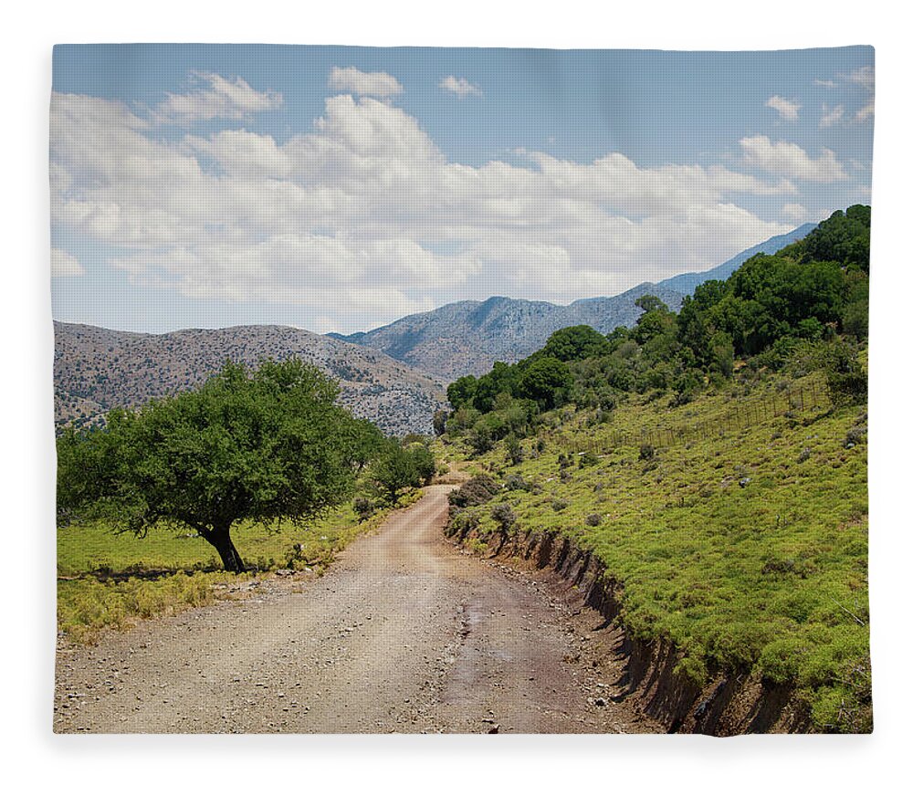 Tranquility Fleece Blanket featuring the photograph Mountain Dirt Road In Northern Crete by Ed Freeman