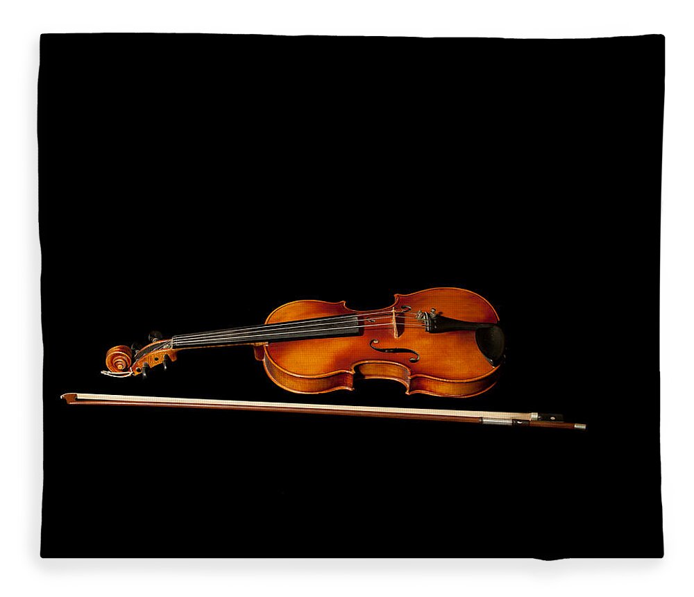 Violin Fleece Blanket featuring the photograph My old fiddle and bow by Torbjorn Swenelius