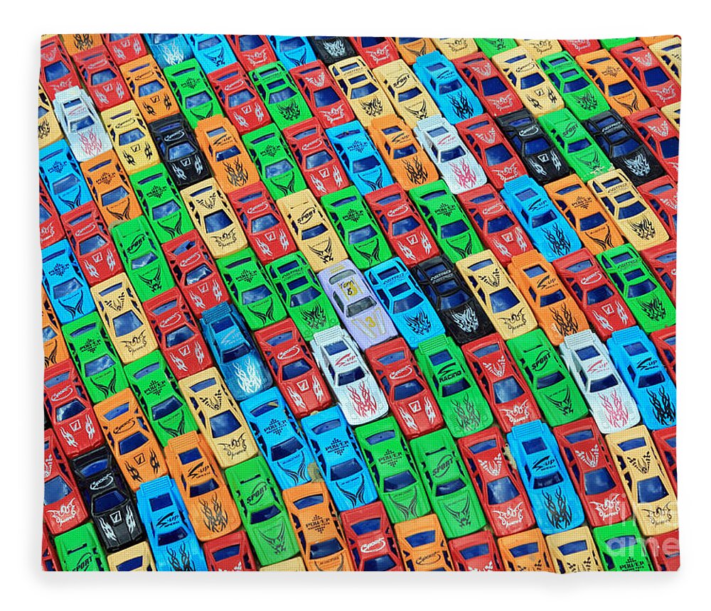 Toy Cars Nose To Tail Traffic Jam Congestion Car Colourful Colorful Bright Colour Color Green Red Blue Packed Childhood Fun Play Time Boys Toys Fender Tightly Tight Crowded Park Parked Rush Hour Fleece Blanket featuring the photograph Nose to Tail by Julia Gavin
