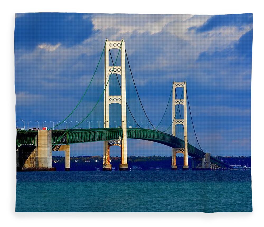 Michigan Fleece Blanket featuring the photograph October Sky Mackinac Bridge by Keith Stokes