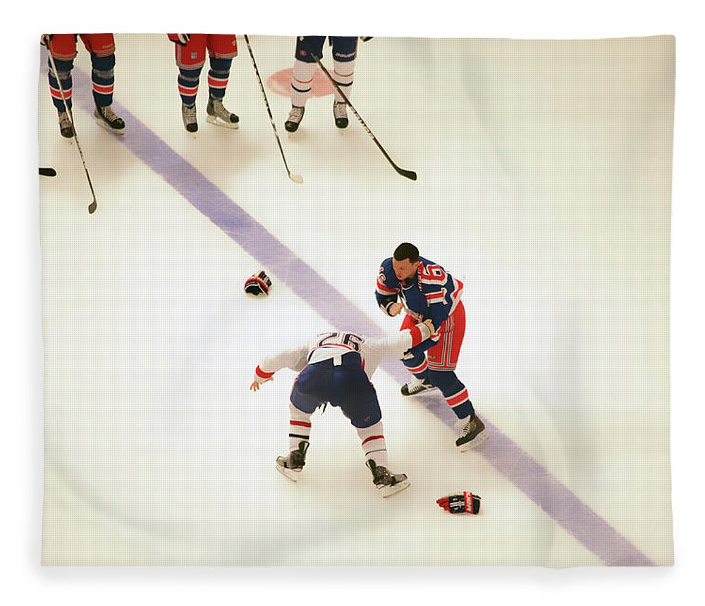 Hockey Fleece Blanket featuring the photograph One Two Punch by Karol Livote