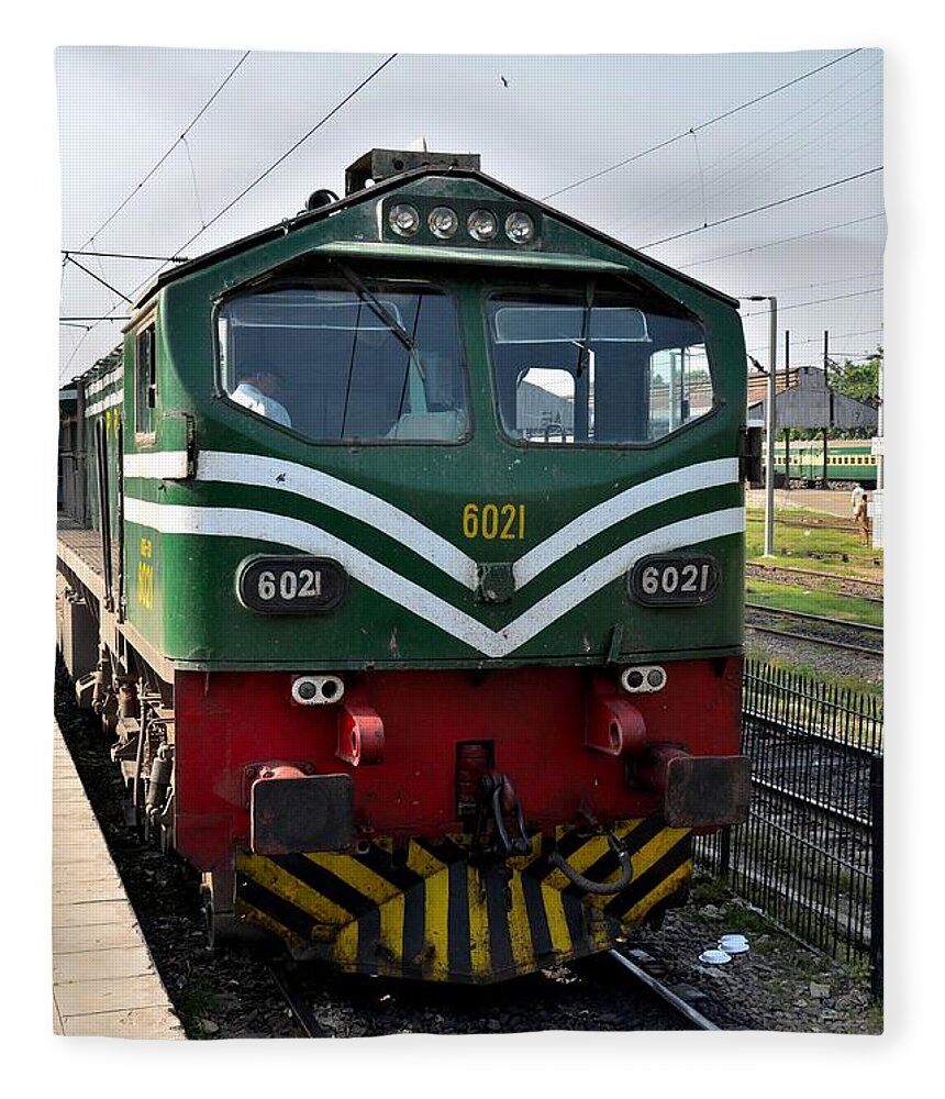 Railways Fleece Blanket featuring the photograph Pakistan Railways diesel electric locomotive engine parked at Lahore train station by Imran Ahmed