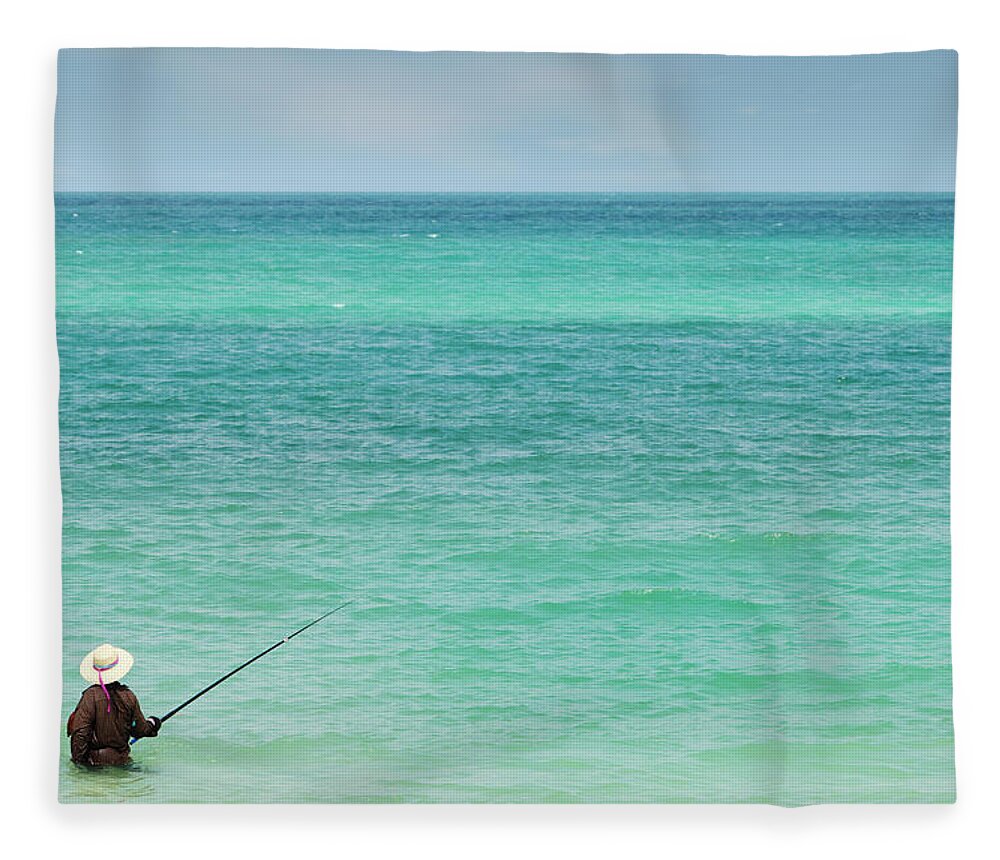 Tranquility Fleece Blanket featuring the photograph Person Fishing In Ocean Off Koh Pangan by Paul Taylor