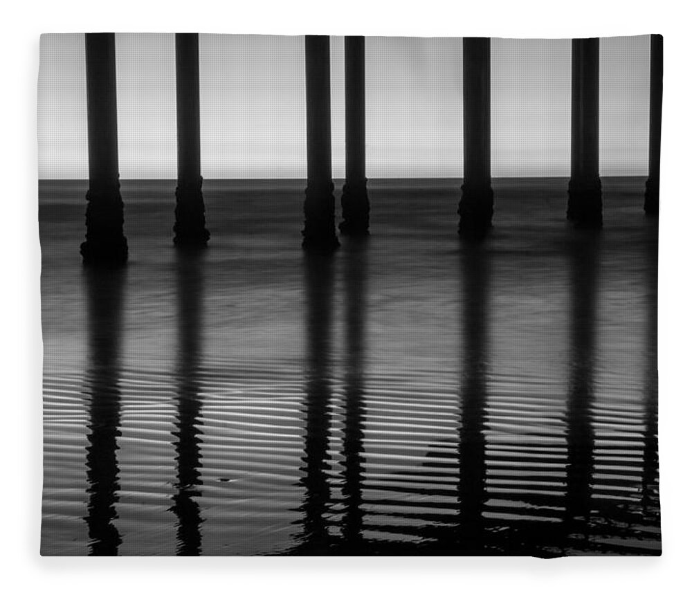 Pier Fleece Blanket featuring the photograph Pier Reflections by Lauri Novak
