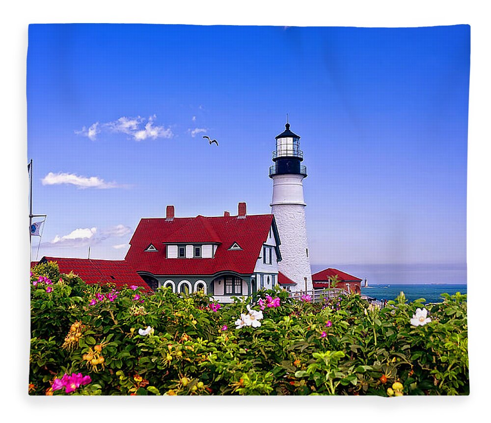 Maine Fleece Blanket featuring the photograph Portland Head Light and Roses by Mitchell R Grosky