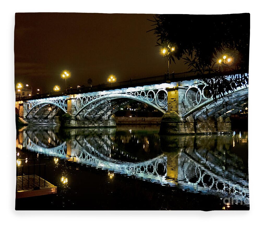 Andalucia Fleece Blanket featuring the photograph Puente Isabel II at night - City of Sevilla by Carlos Alkmin