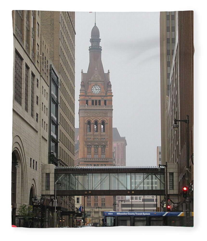 Milwaukee Fleece Blanket featuring the photograph Rain City Hall and Bus by Anita Burgermeister