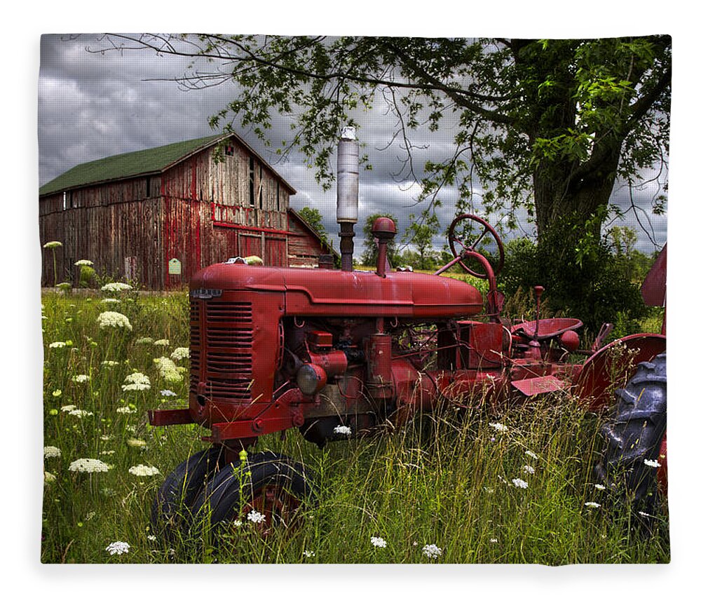 Tractor Fleece Blanket featuring the photograph Reds in the Pasture by Debra and Dave Vanderlaan