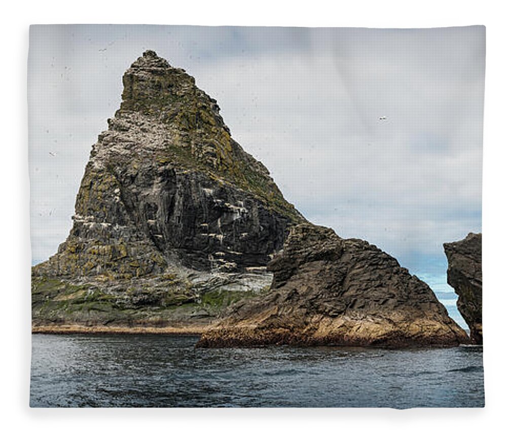 Scenics Fleece Blanket featuring the photograph Seabird Colony Remote Ocean Stack St by Fotovoyager