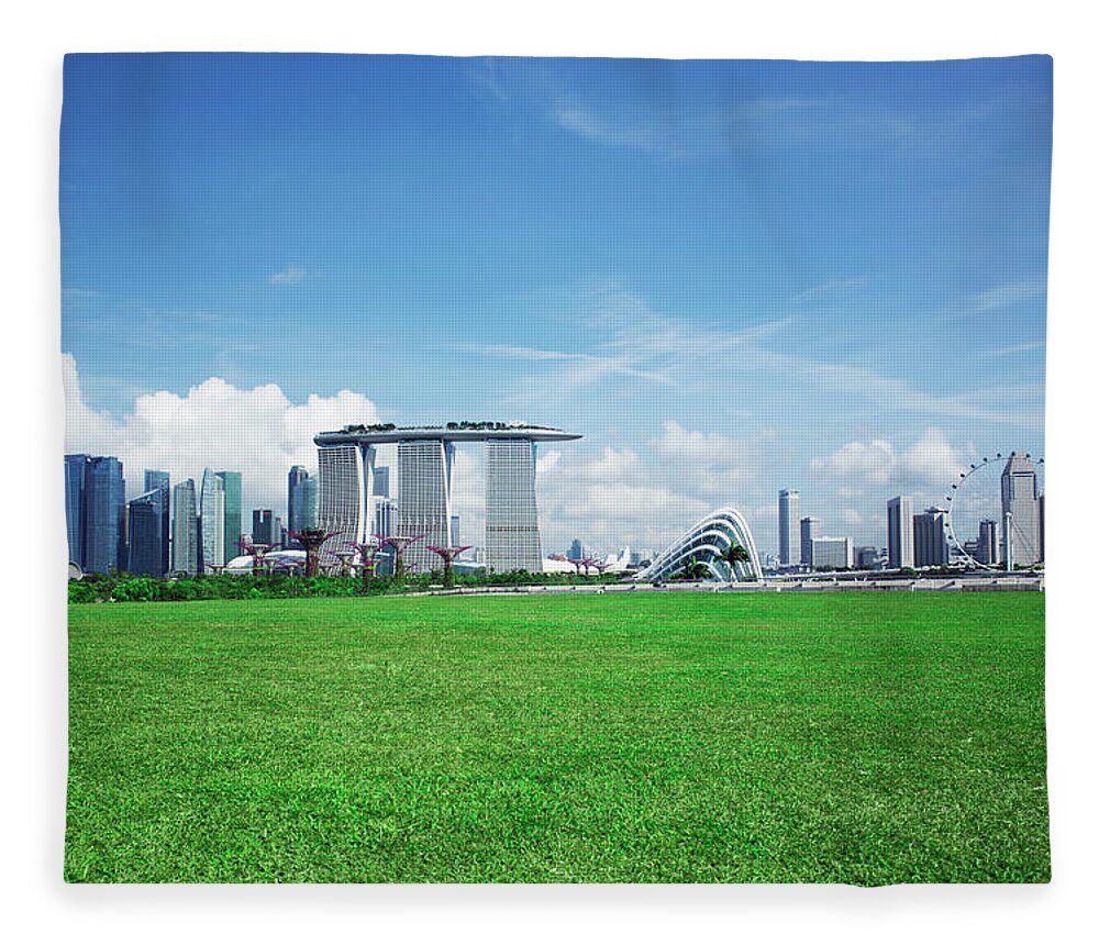 Tranquility Fleece Blanket featuring the photograph Singapore Skyline And Gardens By The Bay by Eternity In An Instant