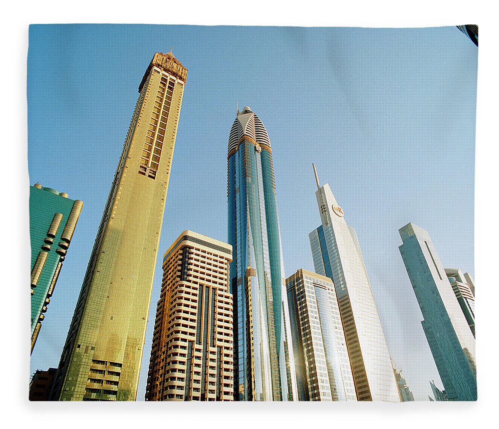 Financial District Fleece Blanket featuring the photograph Skyscrapers Along Sheikh Zayed Road At by Gary Yeowell
