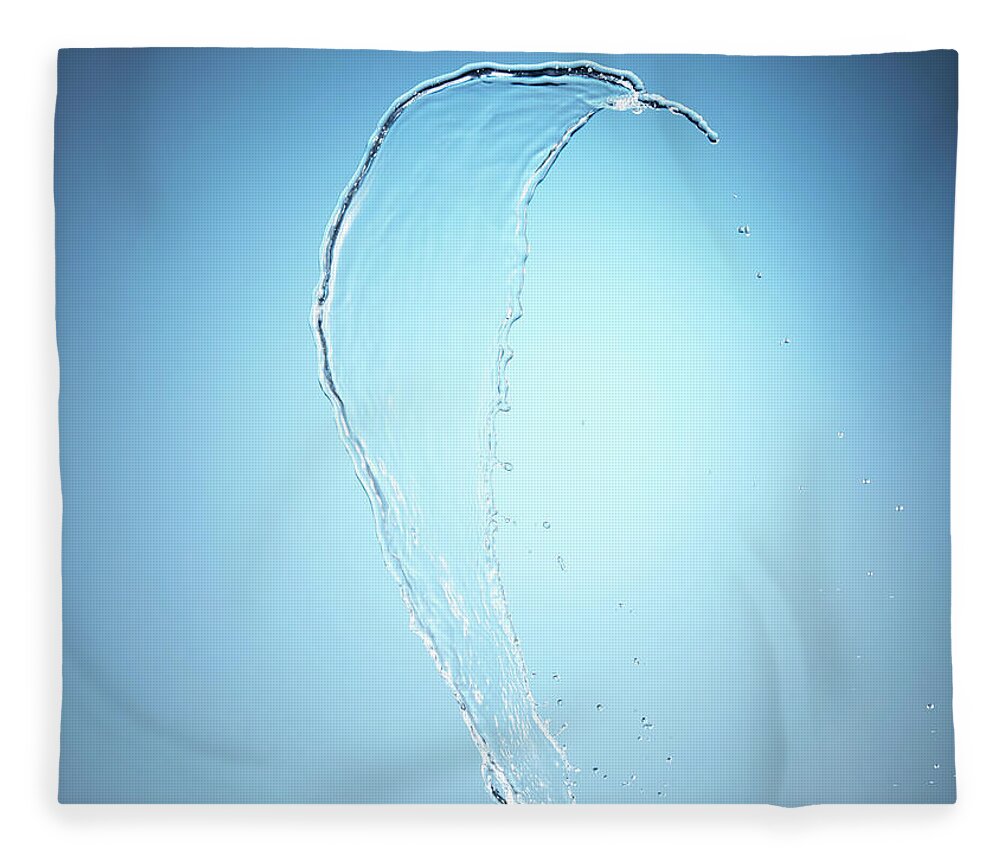 Motion Fleece Blanket featuring the photograph Splashing Of Clean Water On Blue by Level1studio