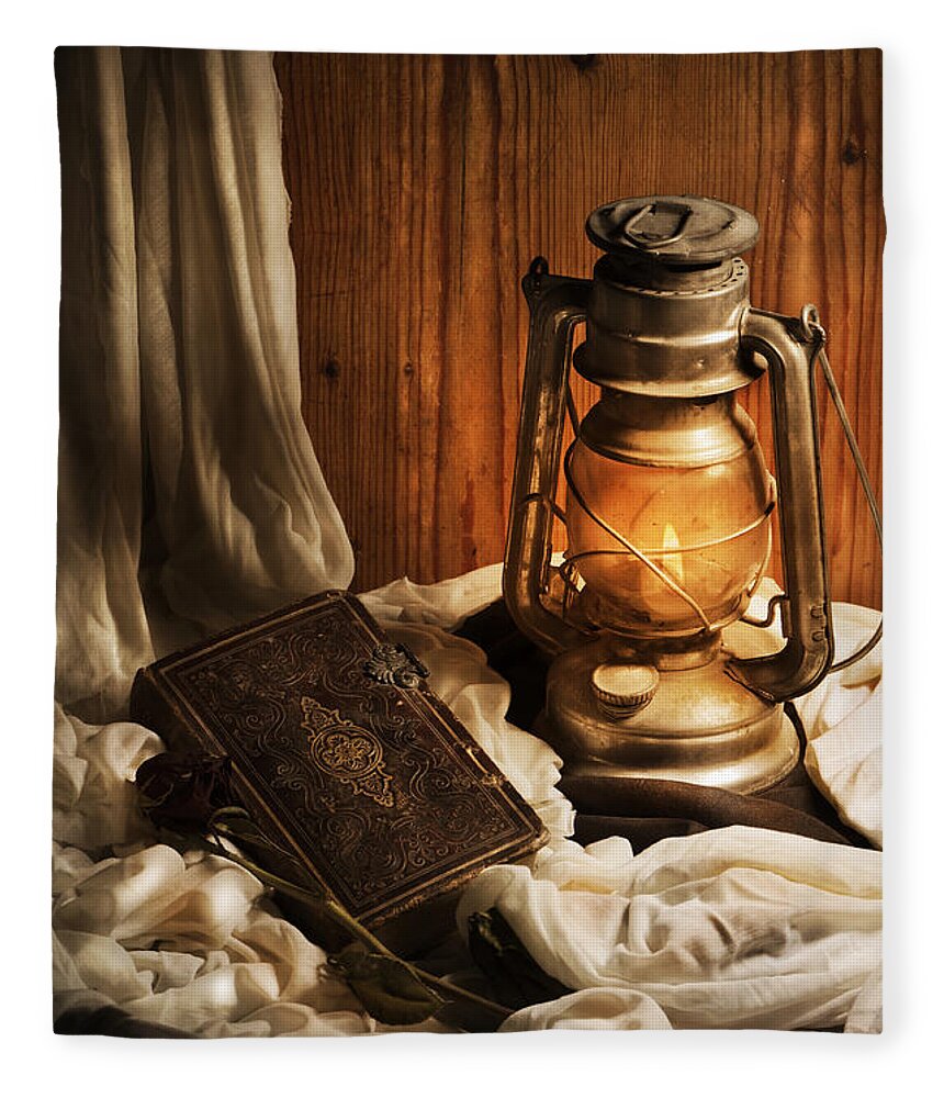 Still Fleece Blanket featuring the photograph Still Life with Lantern and Old Book by Jelena Jovanovic
