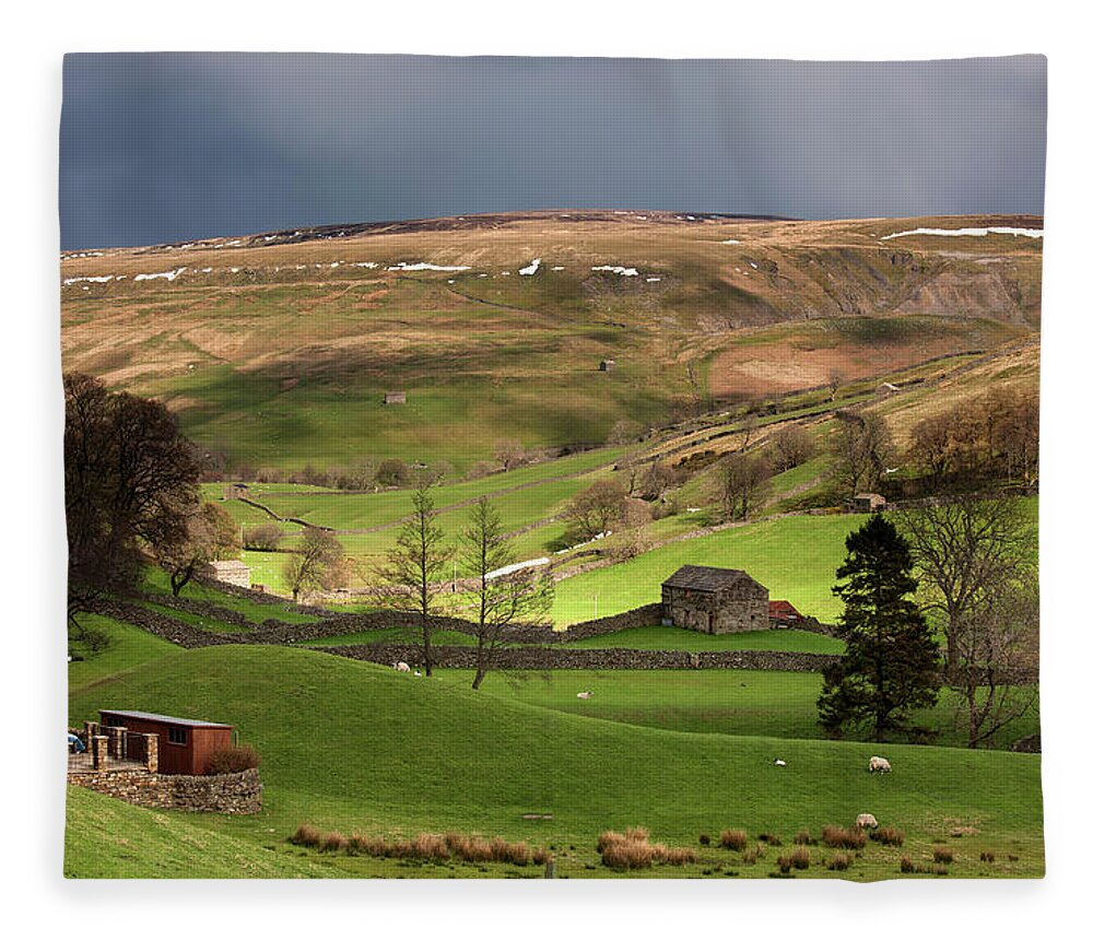 Grass Fleece Blanket featuring the photograph Storm Clouds Over Rolling Hills by John Short / Design Pics