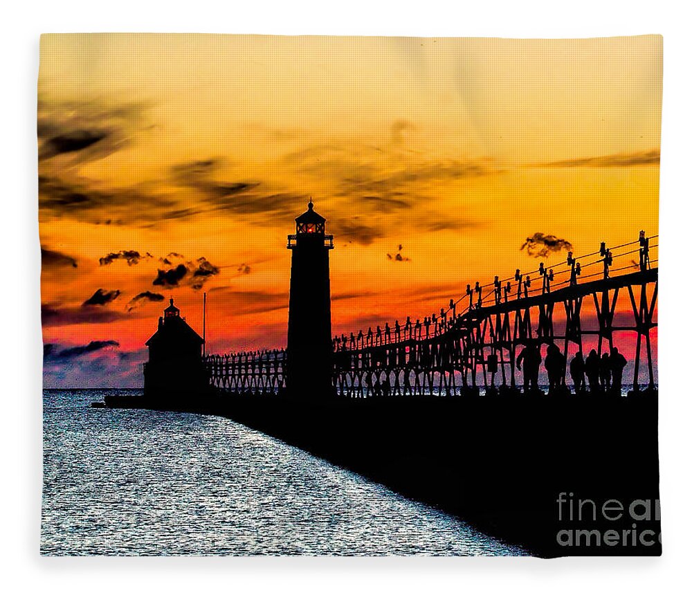 Beach Fleece Blanket featuring the photograph Sunset walking on Grand Haven Pier by Nick Zelinsky Jr