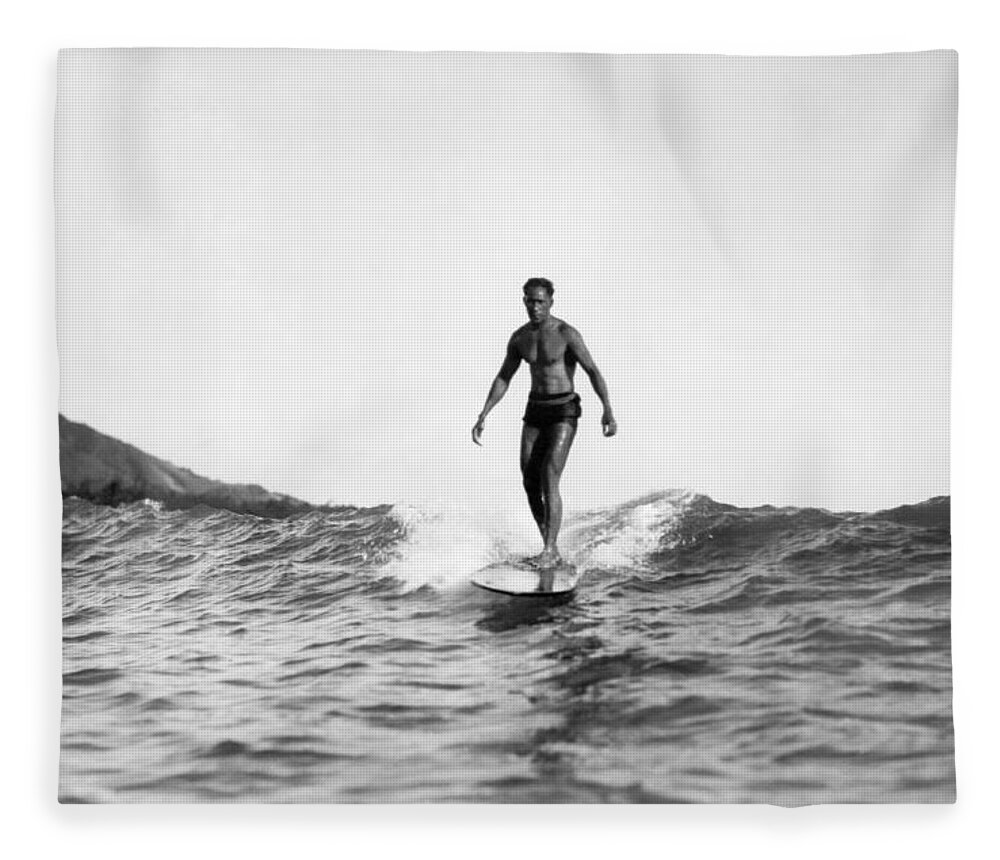 1929 Fleece Blanket featuring the photograph Surfing At Waikiki Beach by Underwood Archives