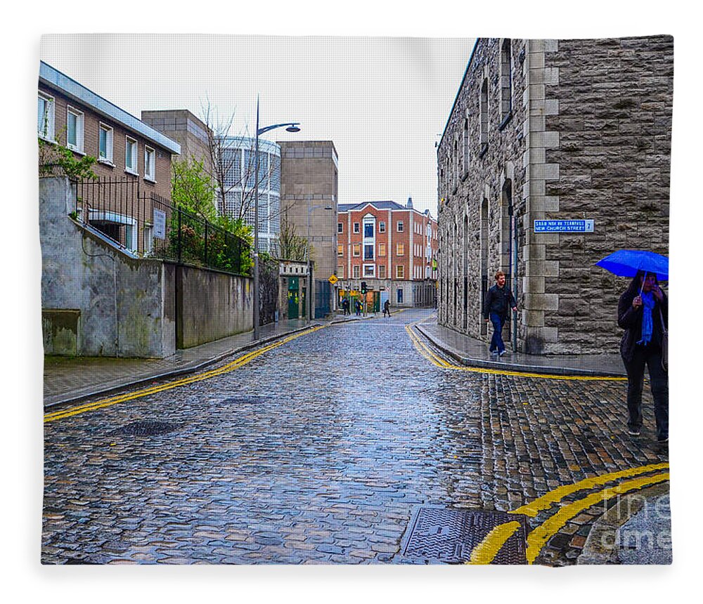 Irish Fleece Blanket featuring the photograph The Blue Umbrella by Mary Carol Story