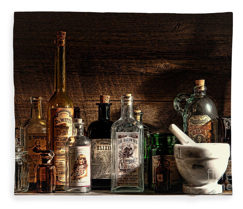 Apothecary Fleece Blanket featuring the photograph The Snake Oil Shop by Olivier Le Queinec