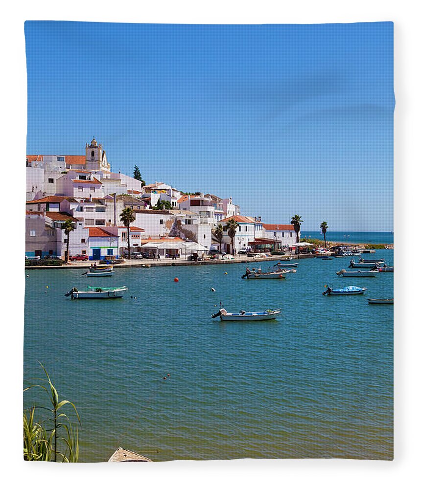 Algarve Fleece Blanket featuring the photograph View Of Ferragudo, Algarve, Portugal by Werner Dieterich