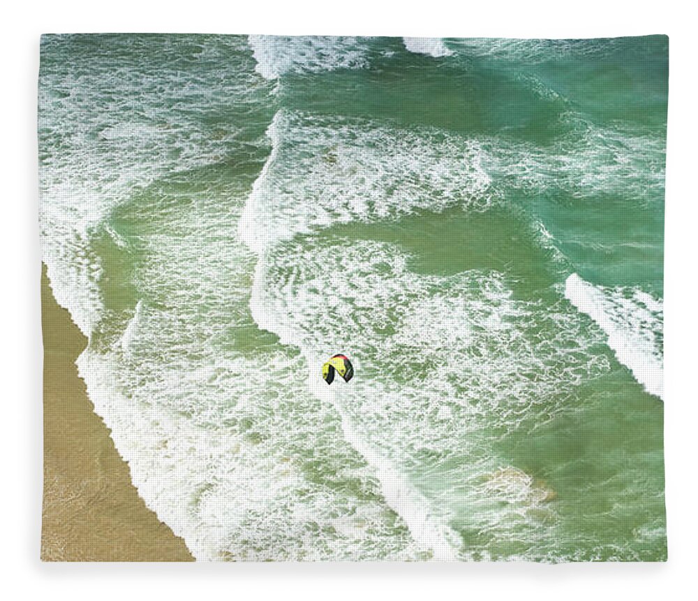Water's Edge Fleece Blanket featuring the photograph Waves Rolling On To The Shore by © William Winkyi