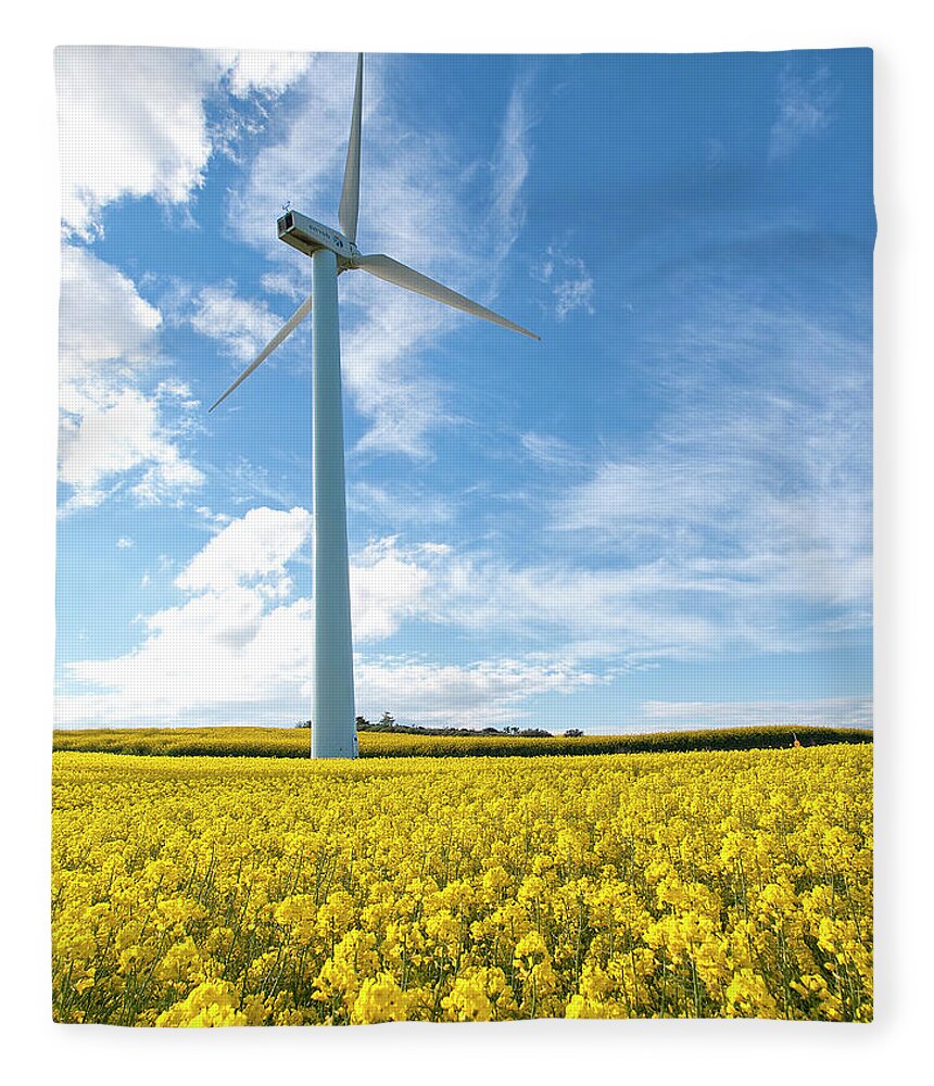 Tranquility Fleece Blanket featuring the photograph Wind Mill On A Yellow Flower Field by Santiago Bañón