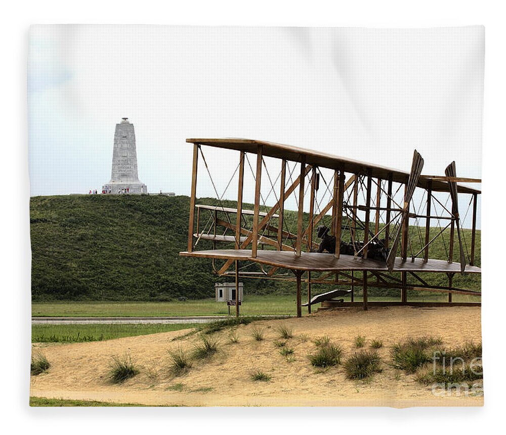 Aeronautical Fleece Blanket featuring the photograph Wright Brothers Memorial at Kitty Hawk by William Kuta