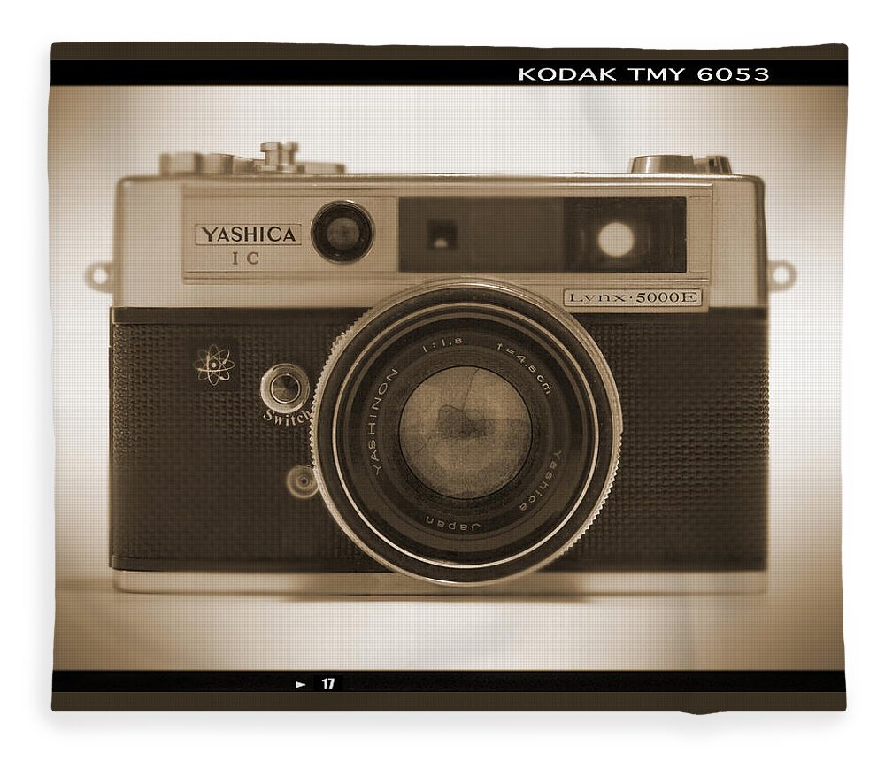 Classic Film Camera Fleece Blanket featuring the photograph Yashica Lynx 5000E 35mm Camera by Mike McGlothlen