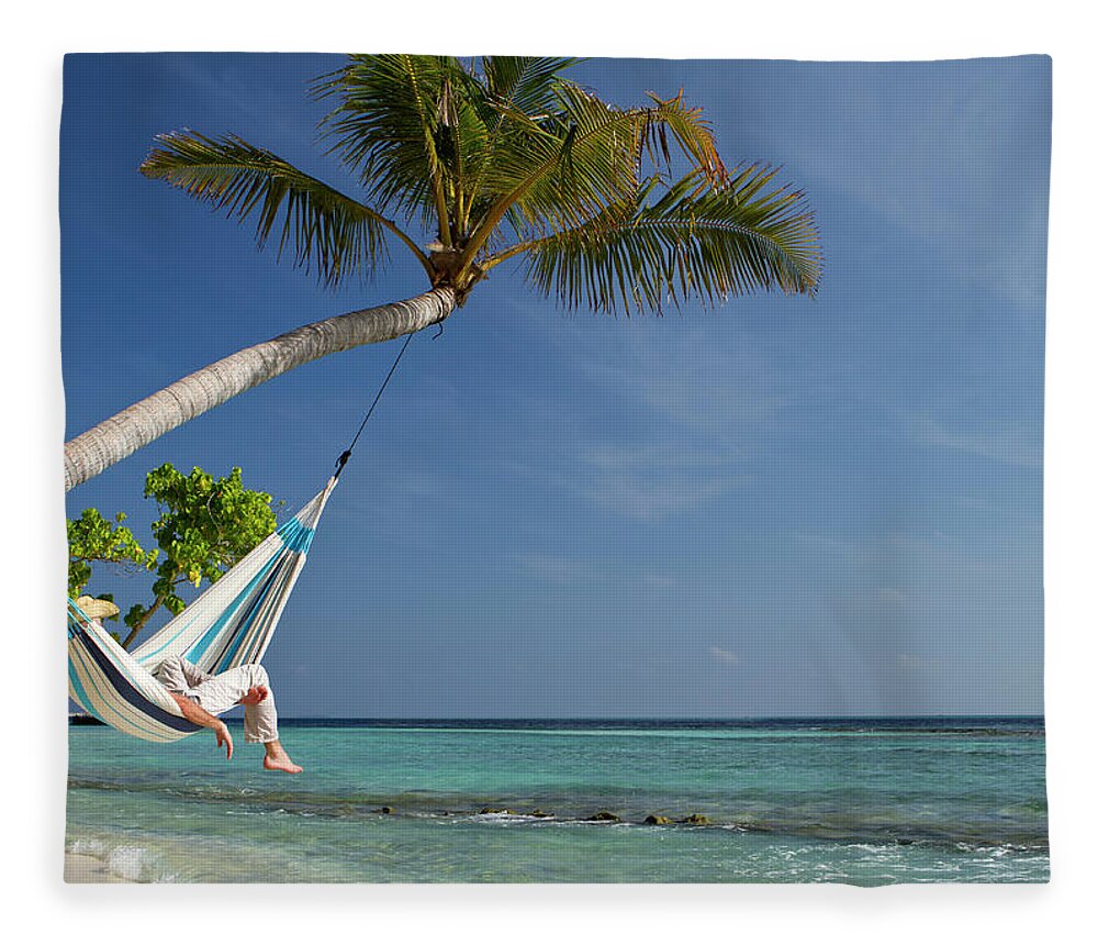 Tropical Tree Fleece Blanket featuring the photograph Young Adult Hammock Napping In Paradise by Joakimbkk