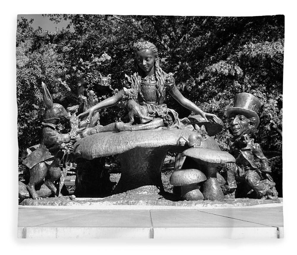 Central Park Fleece Blanket featuring the photograph ALICE IN WONDERLAND in CENTRAL PARK in BLACK AND WHITE by Rob Hans
