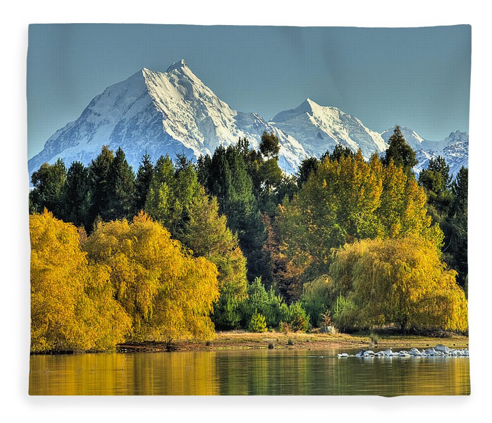 00462458 Fleece Blanket featuring the photograph Fall Willow And Cottonwoods At Lake by Colin Monteath