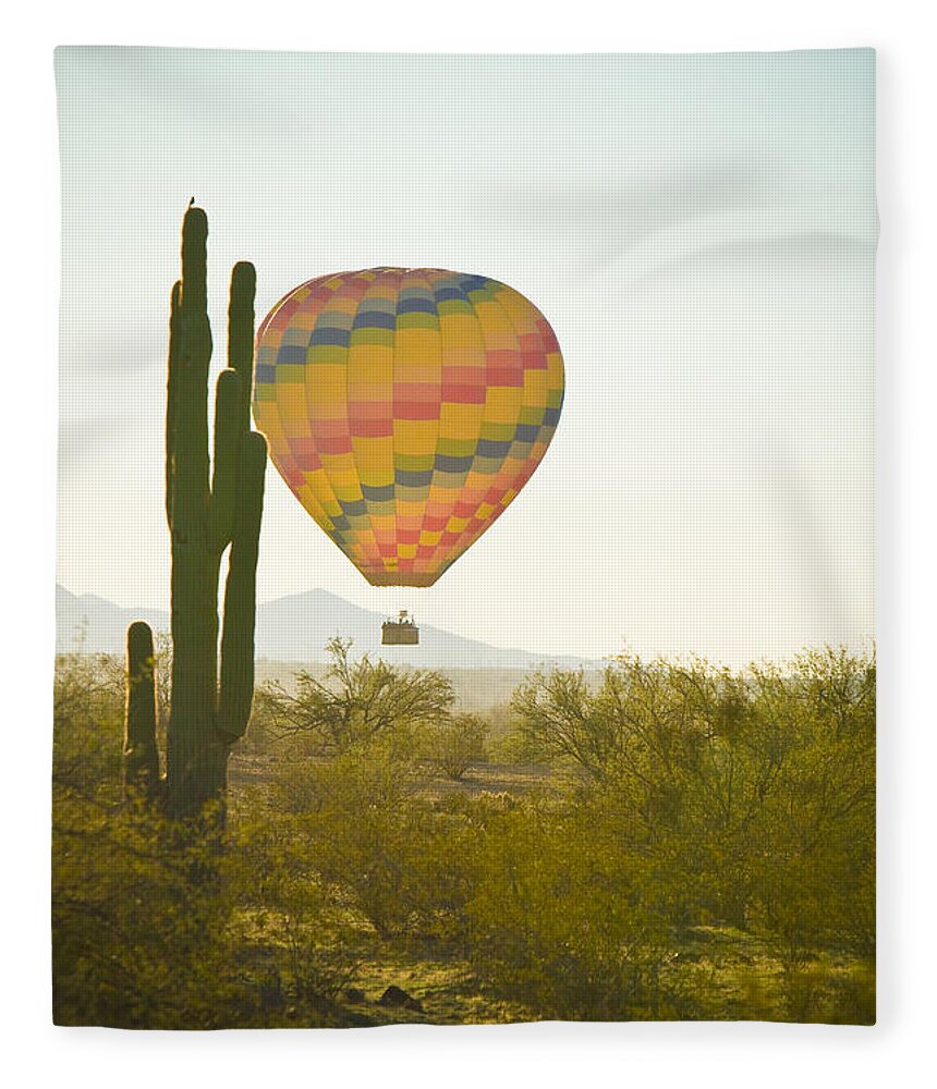 Arizona Fleece Blanket featuring the photograph Hot Air Balloon over the Arizona Desert With Giant Saguaro by James BO Insogna