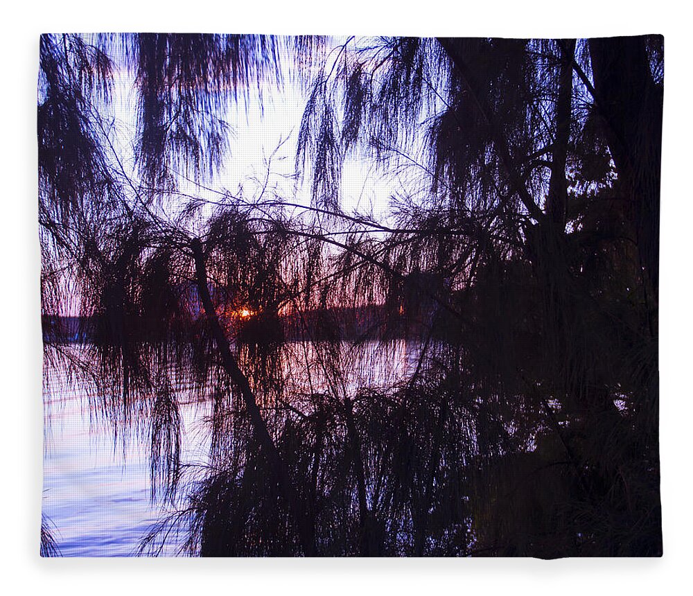 Sunset Fleece Blanket featuring the photograph Sneaking Behind the Trees by Roger Wedegis