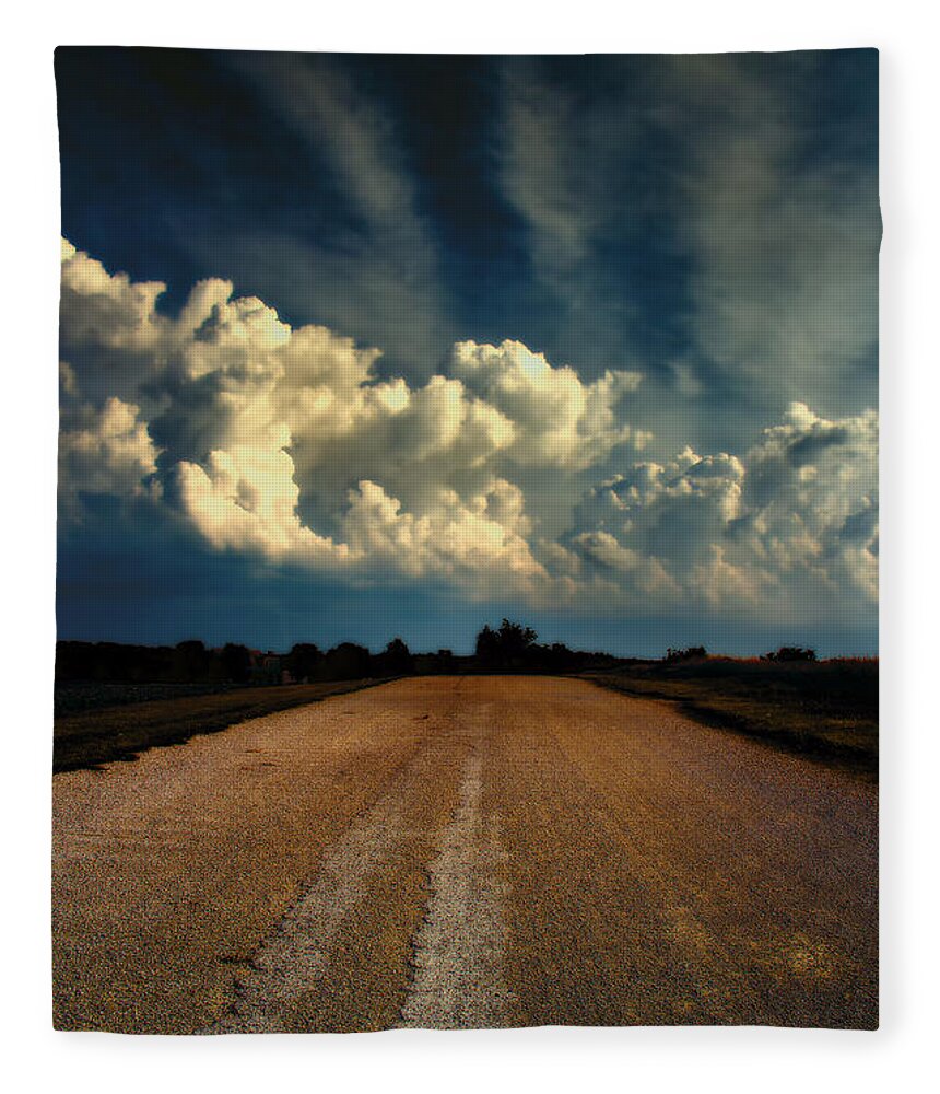 White Clouds Fleece Blanket featuring the photograph Something Wicked Ahead by Bill and Linda Tiepelman