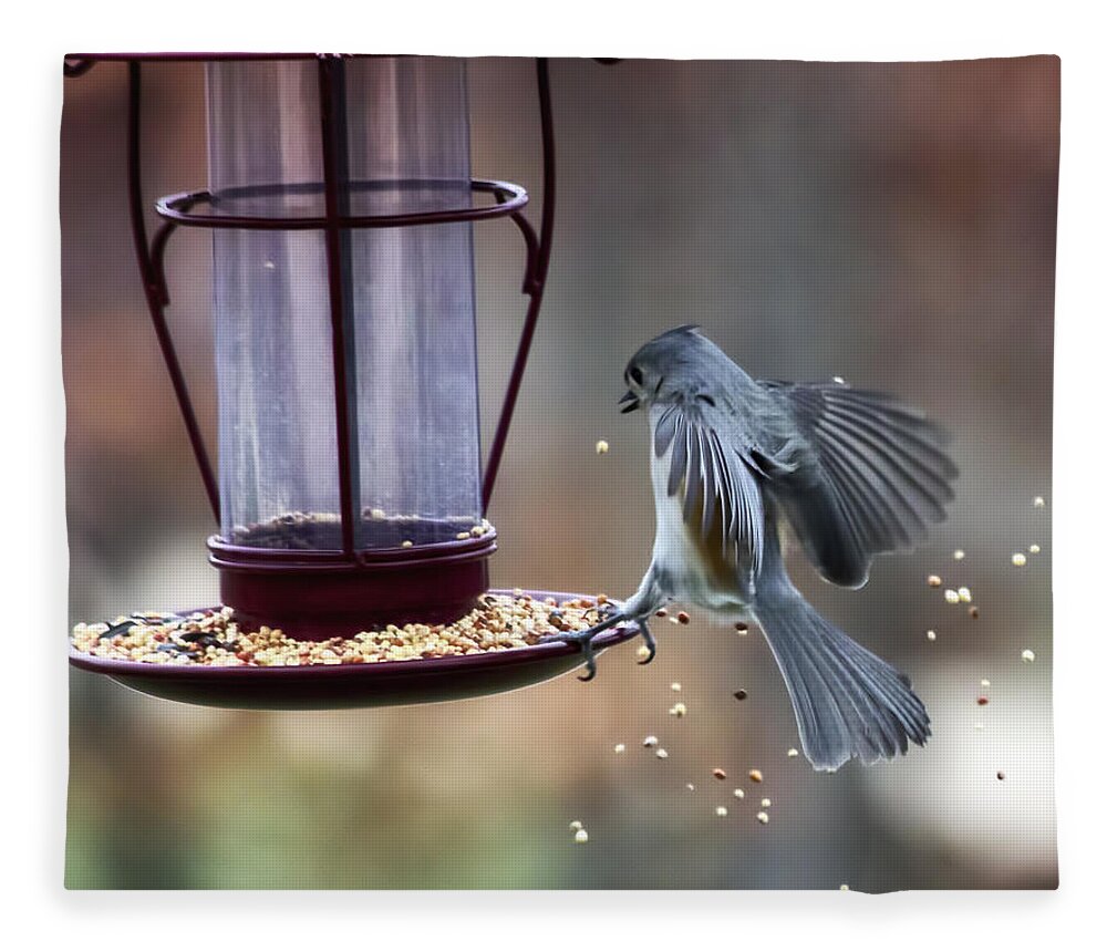 Tufted Titmouse Fleece Blanket featuring the photograph Tufted Seed Splash by Bill and Linda Tiepelman