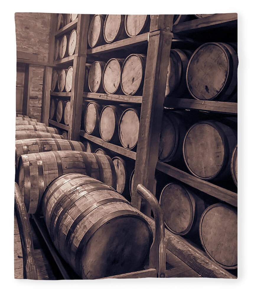 Aging. Age Fleece Blanket featuring the photograph Oak barrels in RIk house #1 by Karen Foley