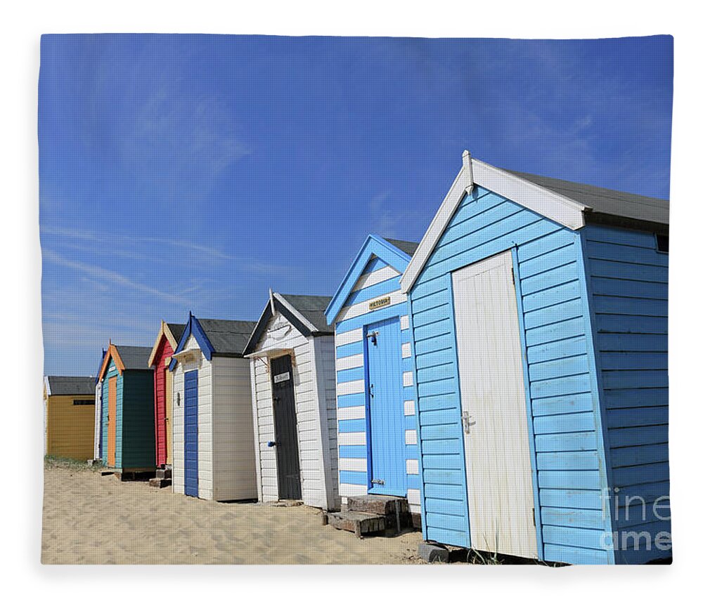 Southwold Beach Huts Suffolk Southwold Suffolk Uk British English England Britain Blue Sky Skies Holiday Resort Hut Red Paint Colourful Colour Colors Colours Bright Famous Fleece Blanket featuring the photograph Southwold Beach Huts #2 by Julia Gavin