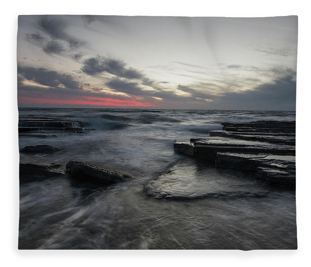 Seascape Fleece Blanket featuring the photograph Shipwreck of an abandoned ship on a rocky shore by Michalakis Ppalis