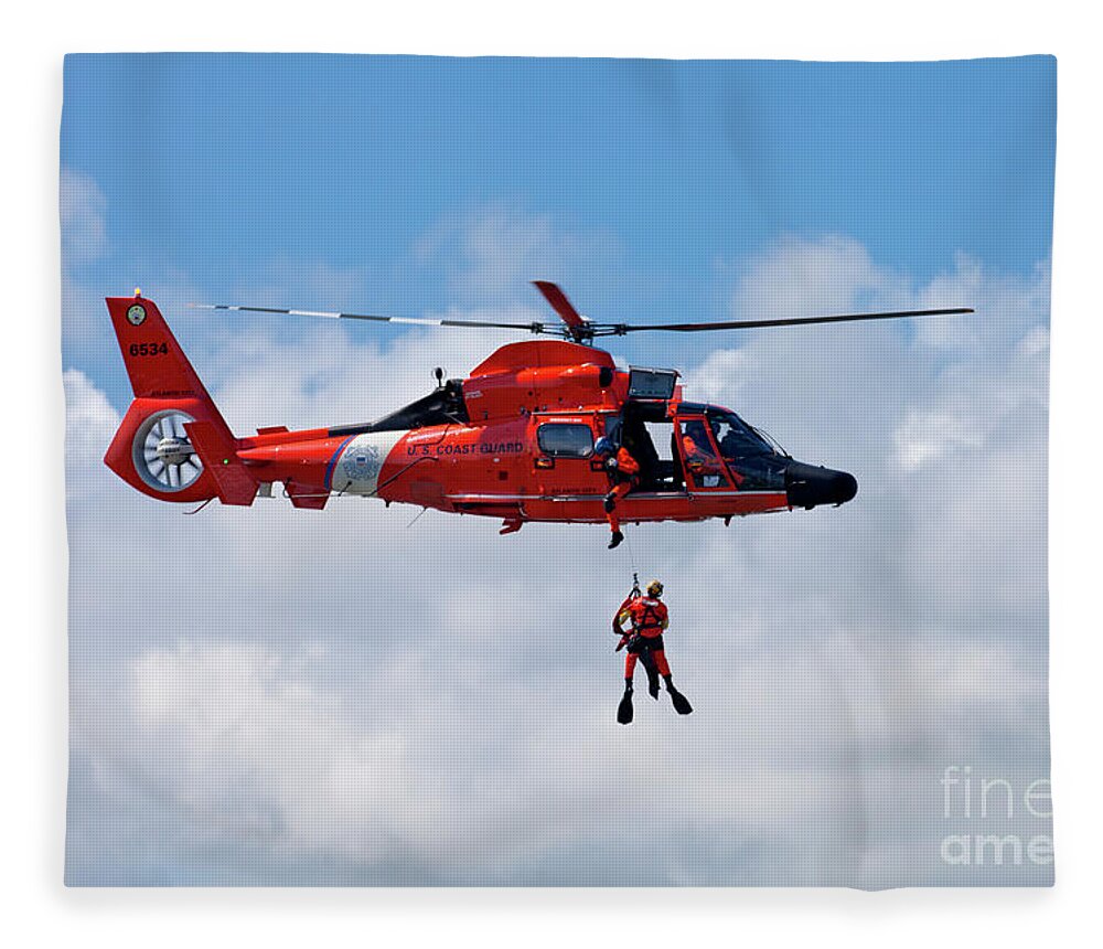 Coast Guard Fleece Blanket featuring the photograph US Coast Guard MH-65-C Dauphin Rescue helicopter #2 by Anthony Totah