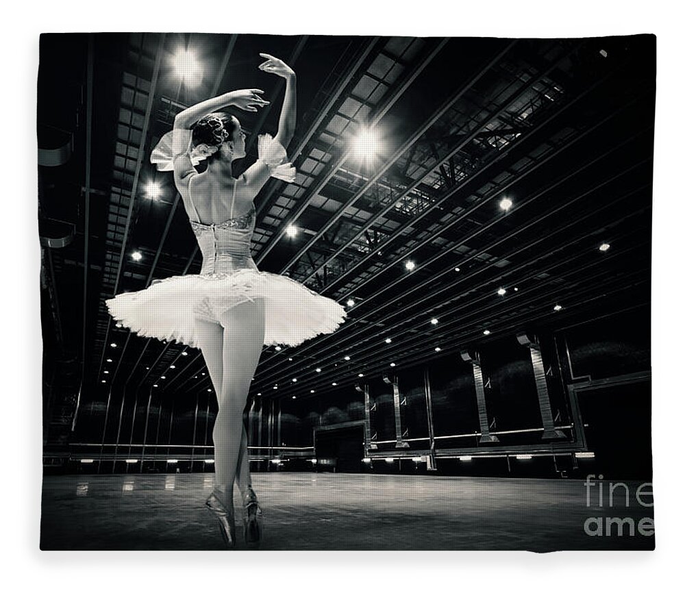 Ballet Fleece Blanket featuring the photograph A beautiful ballerina dancing in studio by Dimitar Hristov