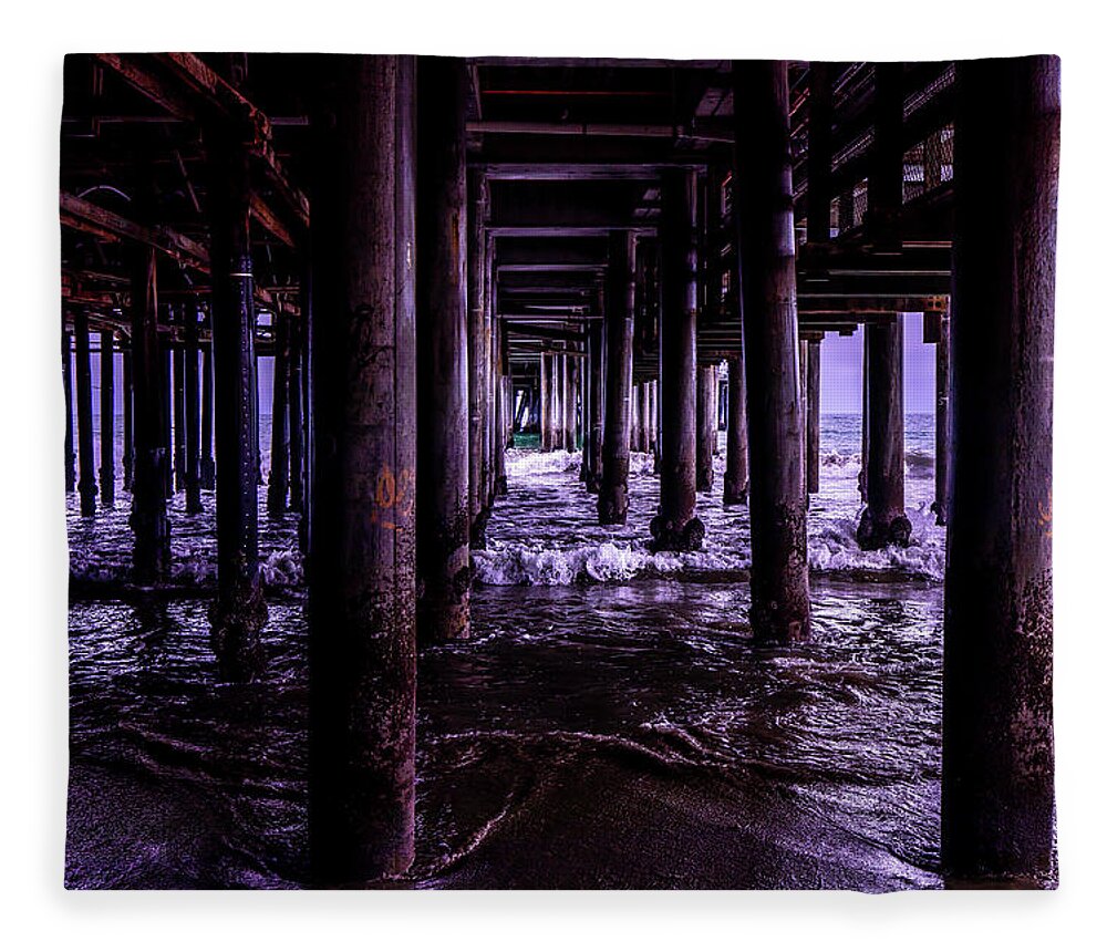 Under The Pier Fleece Blanket featuring the photograph A Cloudy Day Under The Pier by Gene Parks