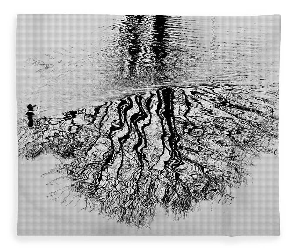 Puddle Fleece Blanket featuring the photograph A Duck Drawing on the Puddle of Water by Daisuke Takano