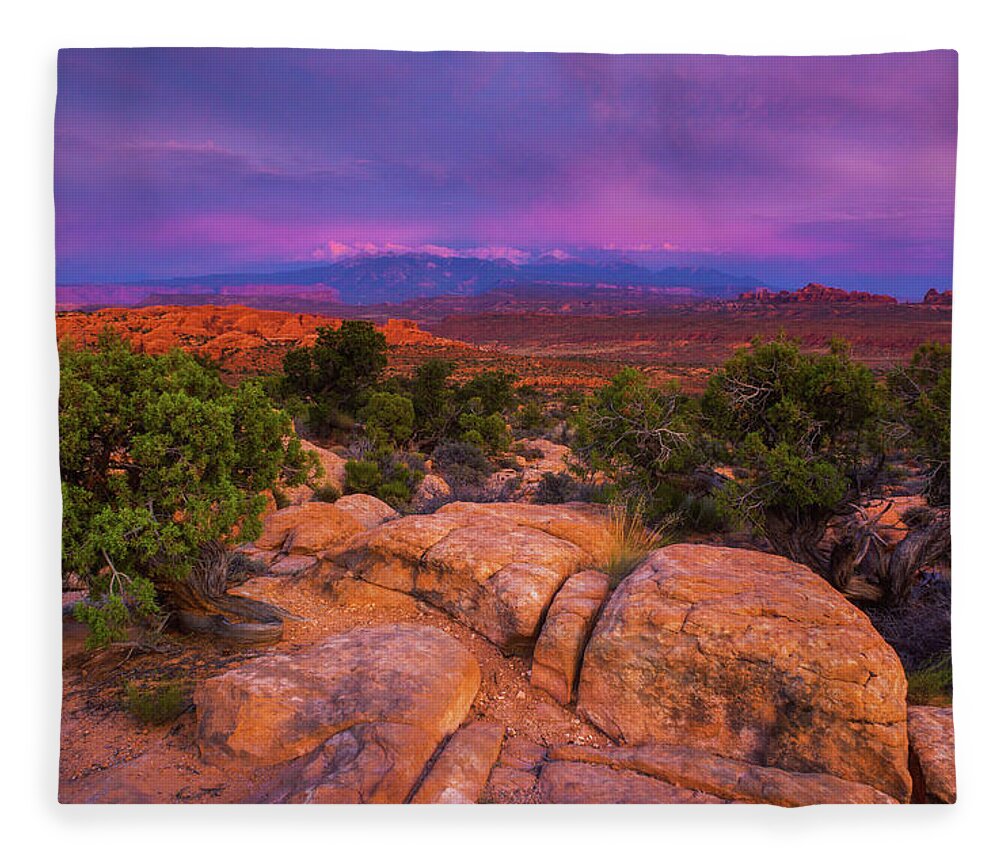 Arches National Park Fleece Blanket featuring the photograph A Sunset Over Arches by John De Bord