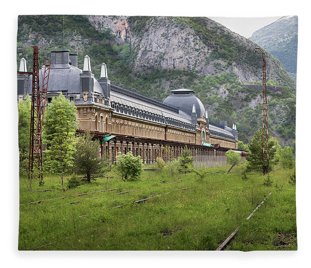 Canfranc Fleece Blanket featuring the photograph Abandoned side of the Canfranc international railway station by RicardMN Photography