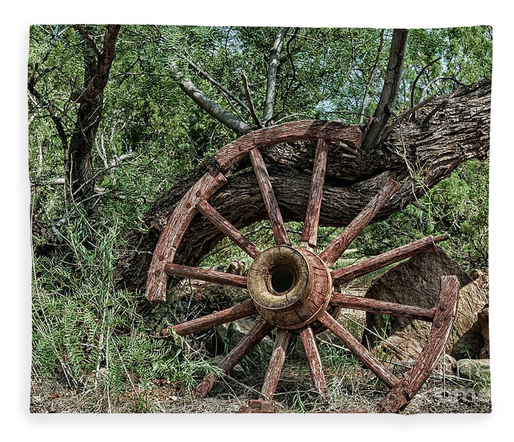 Wagon Wheel Fleece Blanket featuring the photograph Abandoned wagon wheel by Paul Quinn