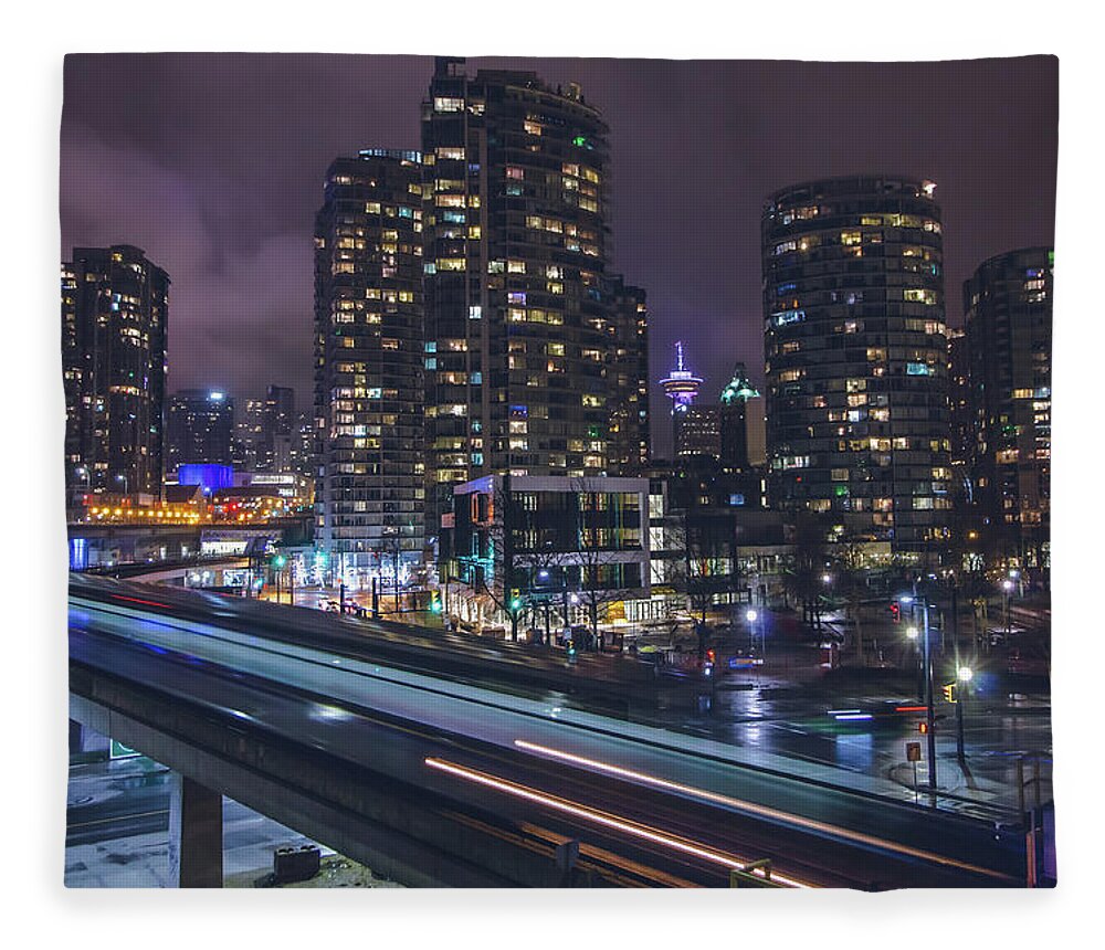 Vancouver Fleece Blanket featuring the photograph Above the Skytrain by Jay Smith