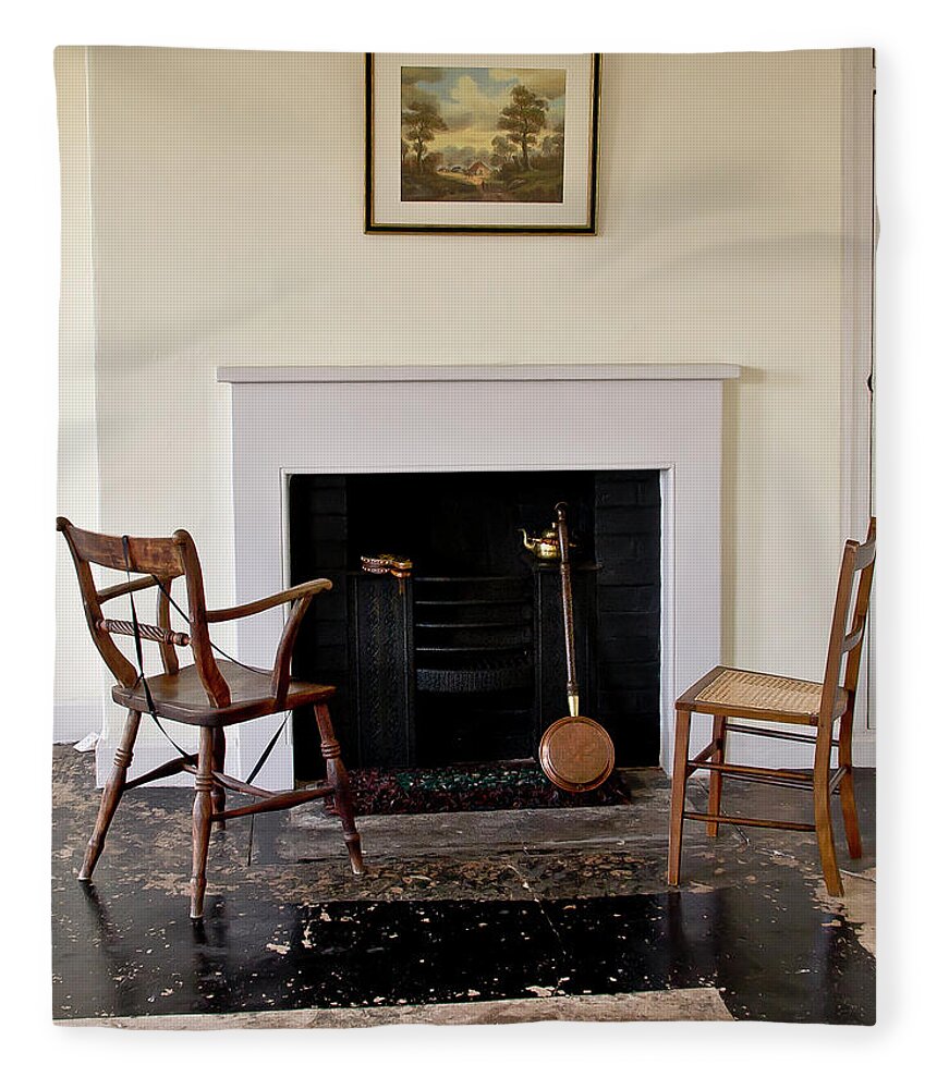 Fireplace Fleece Blanket featuring the photograph At the cold fireplace. by Elena Perelman