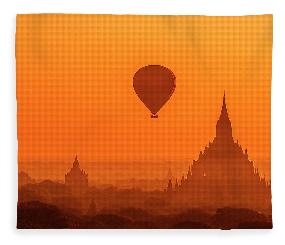  Fleece Blanket featuring the photograph Bagan pagodas and hot air balloon by Pradeep Raja Prints